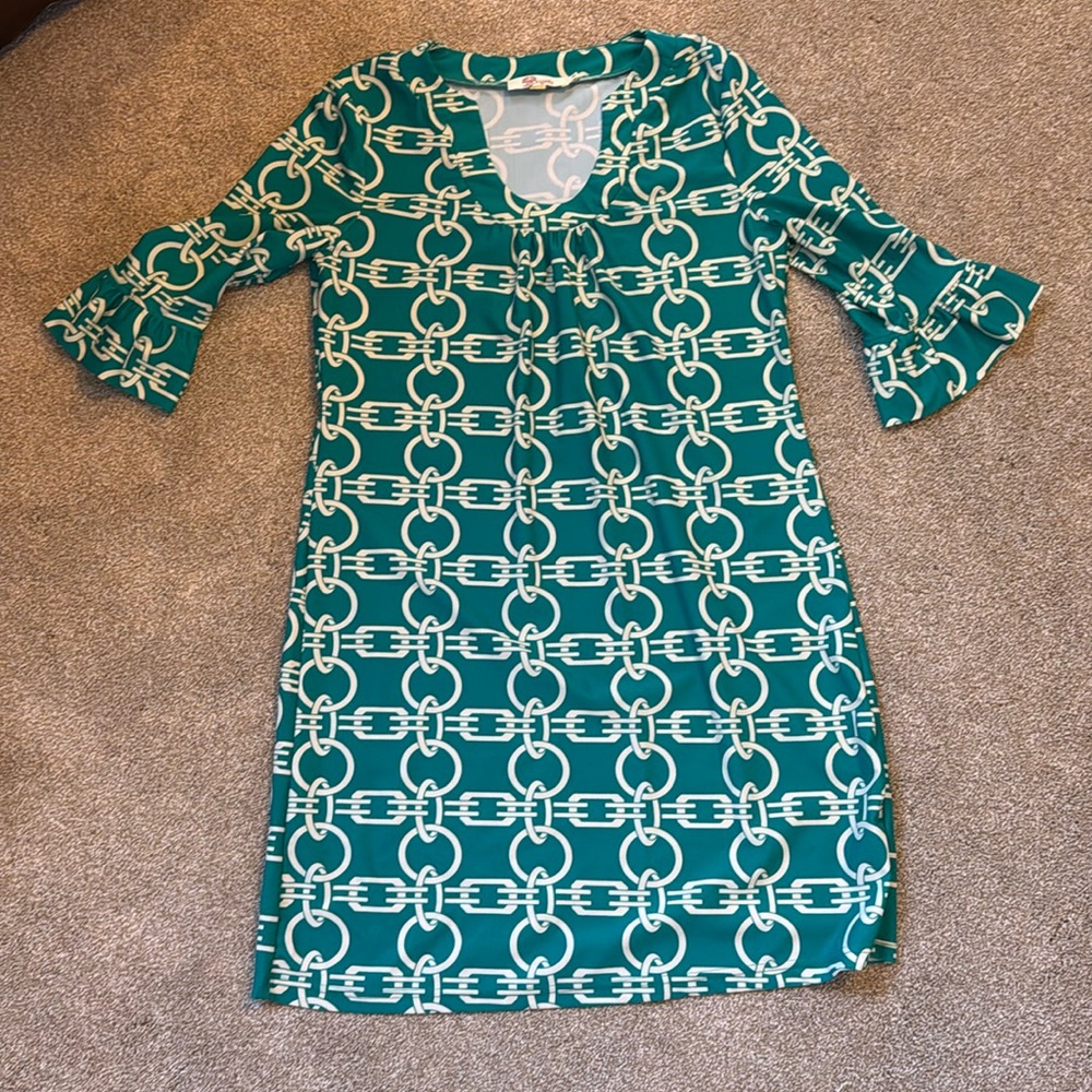 Turquoise dress. Professional. Size small 
Great condition!